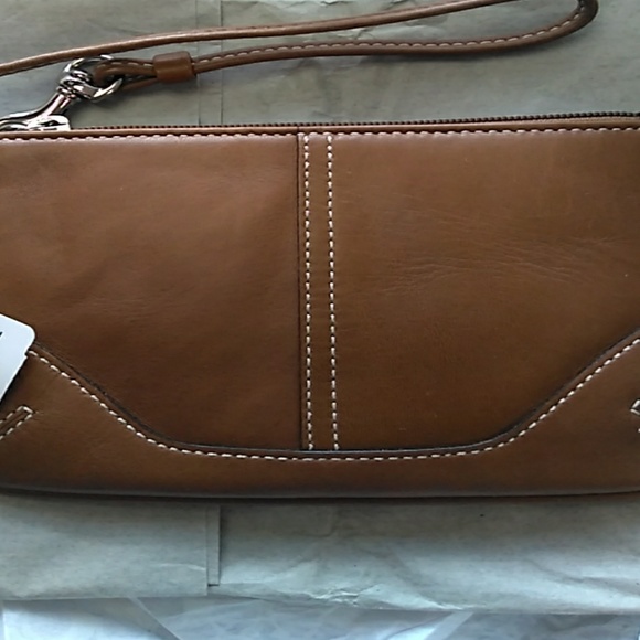 Coach Handbags - Coach Tan Wristlet Logo Interior New in Bag